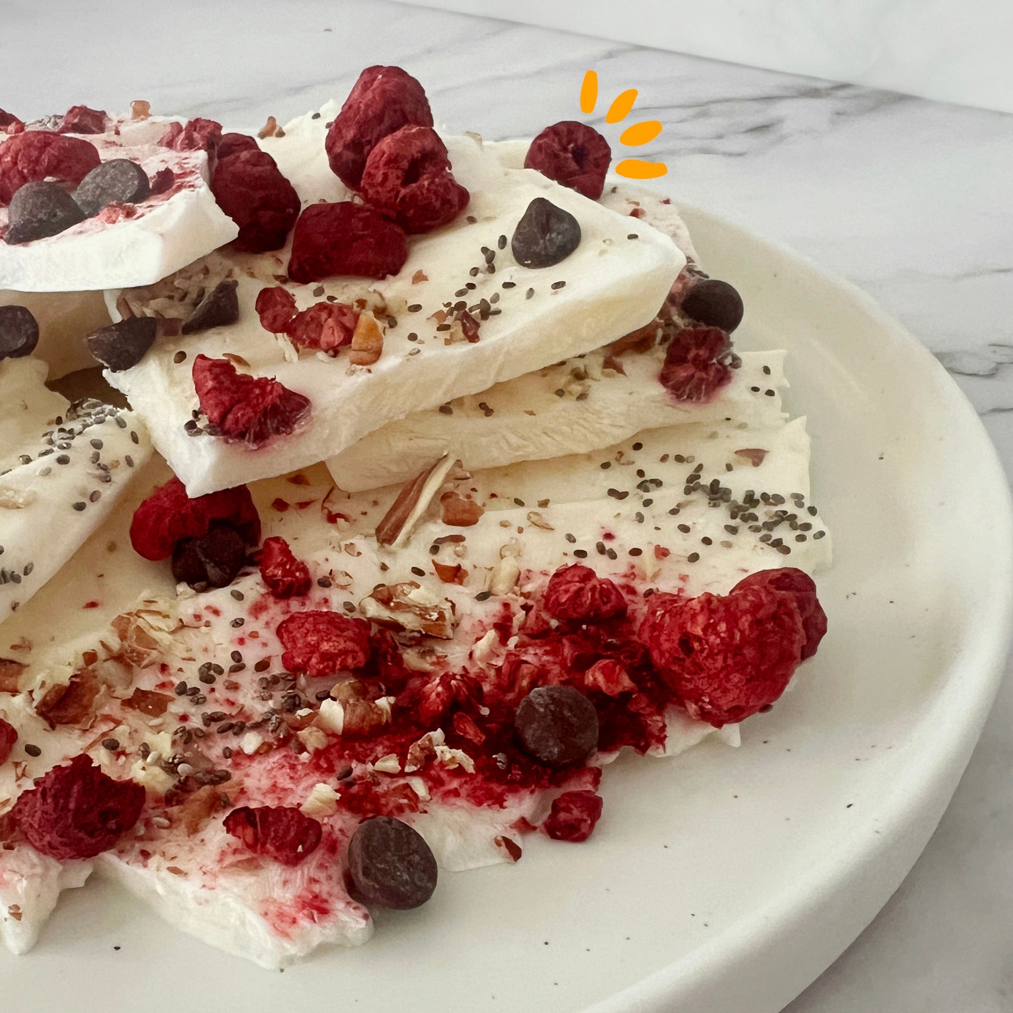 Pieces of freezed yogurt with chia and freeze-dried fruits