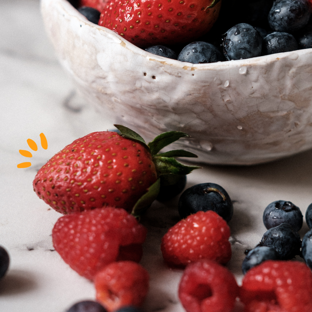 Strawberries, raspberries and blueberries bowl