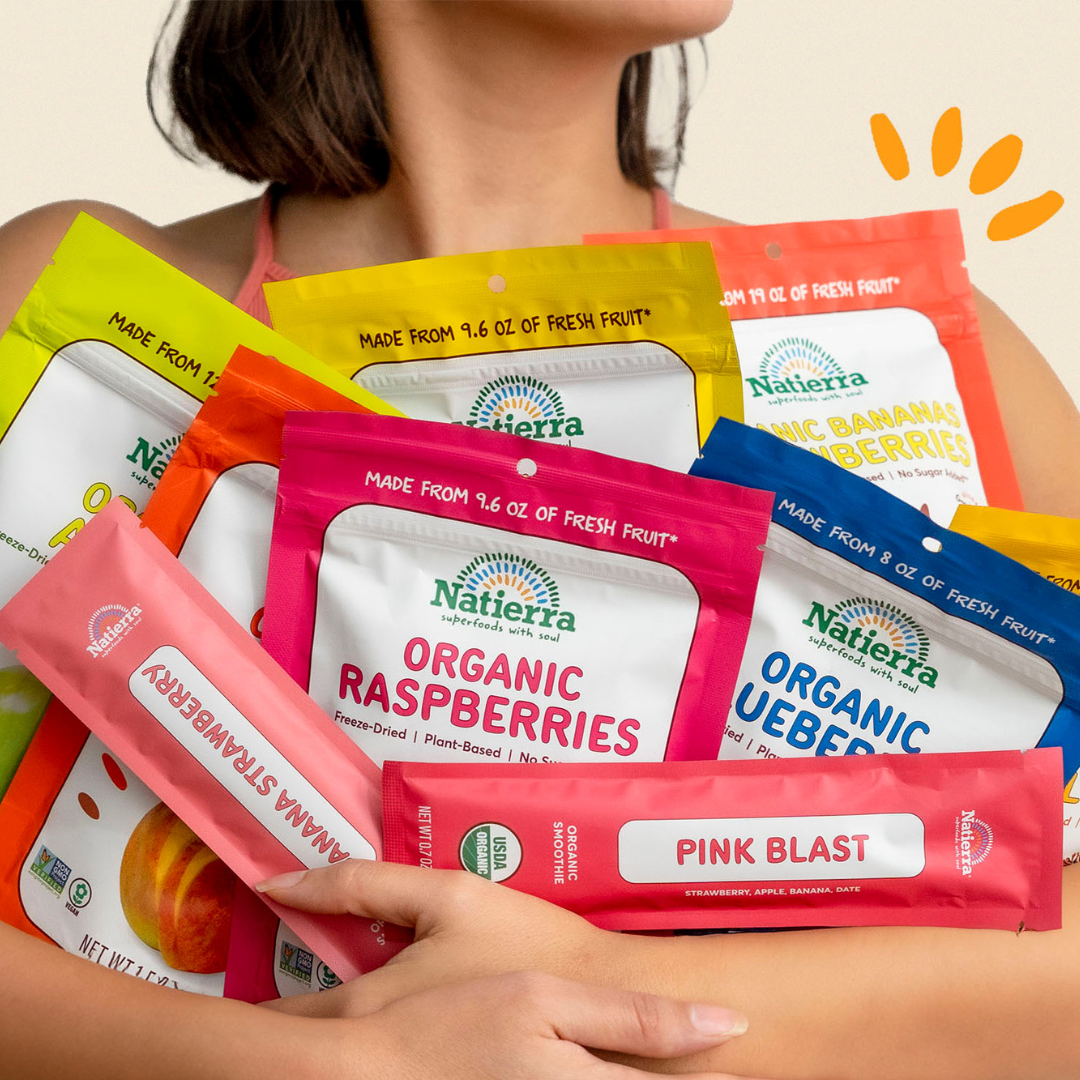 Women carrying bags of freeze-dried fruits snacks and smoothie packets