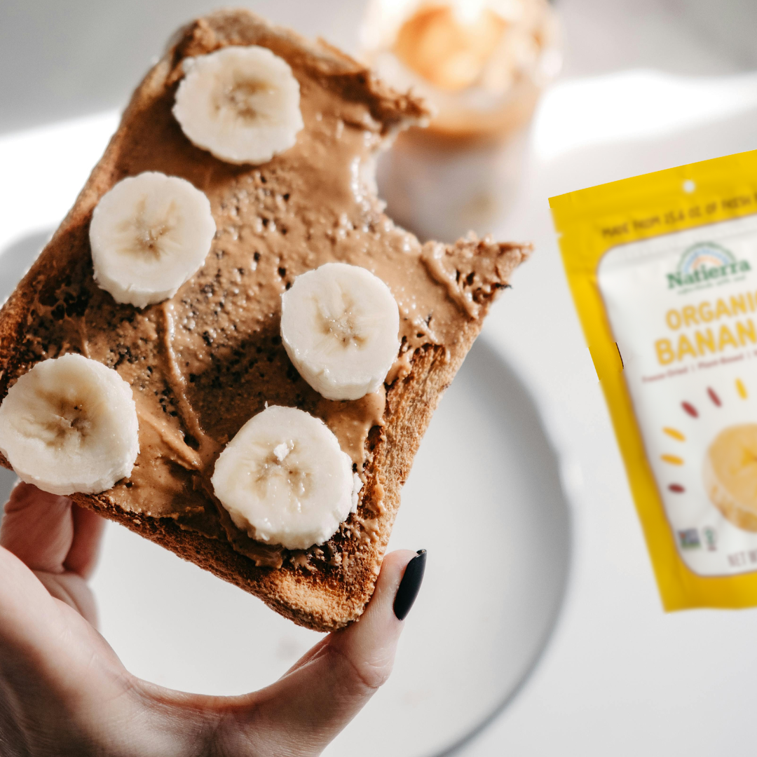 piece of toast with peant butter and banana next to a bag of freeze dried banana