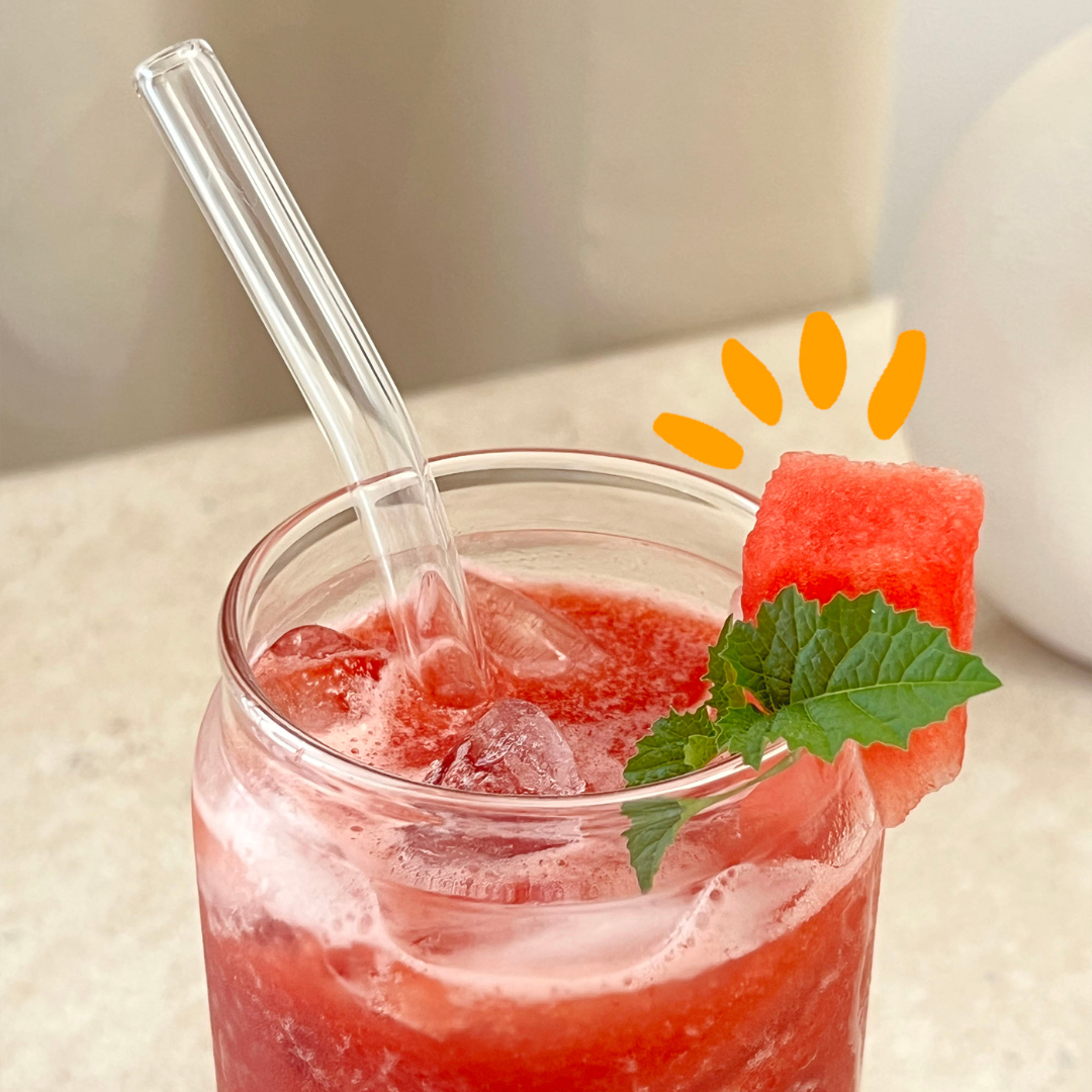 Watermelon refresher drink in a glass with a straw