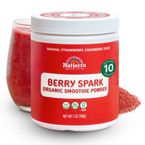 Natierra Berry Spark Organic Smoothie jar with glass and powder in the background thumbnail