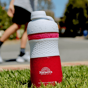 Shaker with pink Blast smoothie, with basketball player in background thumbnail